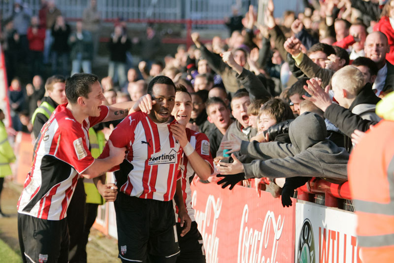 Miles Weston being congratulated